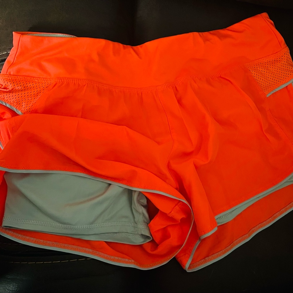Danskin Now Dri-More Semi-Fitted Neon Orange running shorts